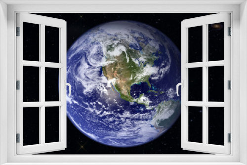 Fototapeta Naklejka Na Ścianę Okno 3D - The mother Earth, against the background of the star sky, with the far galaxy. Elements of this image were furnished by NASA