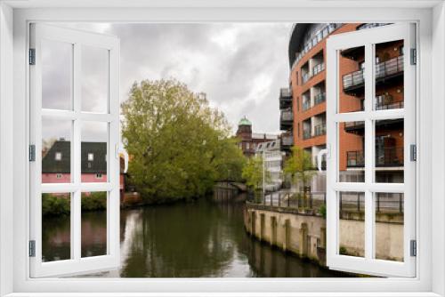 Fototapeta Naklejka Na Ścianę Okno 3D - A view down the River Wensum in the city of Norwich,