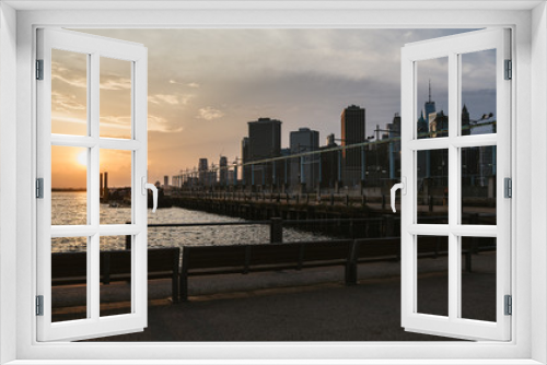 Fototapeta Naklejka Na Ścianę Okno 3D - Sunset Manhattan