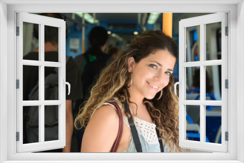 Young woman traveling by train. People lifestyle.