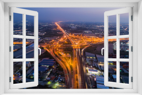 Fototapeta Naklejka Na Ścianę Okno 3D - Aerial view Night Expressway, toll way, highway, roads in the city. transportation traffic.