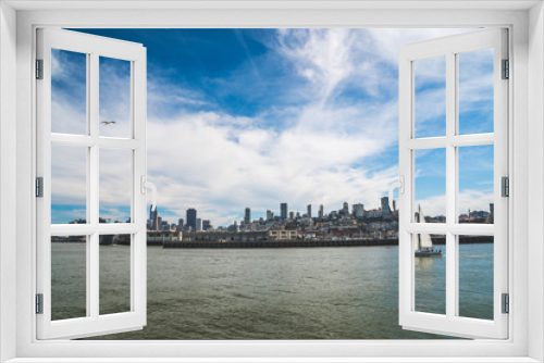 Fototapeta Naklejka Na Ścianę Okno 3D - Panoramic symbolic view of San Francisco city from a boat tour on a sunny day with clear blue skies, California