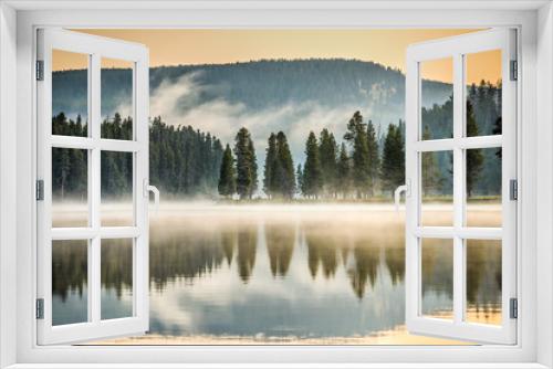 Fototapeta Naklejka Na Ścianę Okno 3D - Pine Trees Reflect on Misty Yellowstone River - 1
