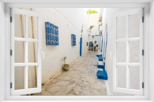 Fototapeta Naklejka Na Ścianę Okno 3D - Hammamet Medina streets with blue walls. Tunis, north Africa