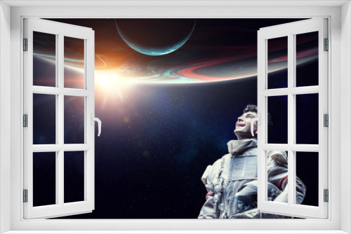 Fototapeta Naklejka Na Ścianę Okno 3D - Spaceman and planets abstract theme