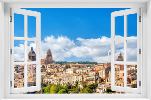 Fototapeta Naklejka Na Ścianę Okno 3D - Santa Maria delli'Idria in the foreground and Ragusa Ibla Sicily behind