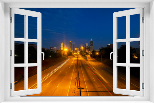Fototapeta Naklejka Na Ścianę Okno 3D - Atlanta Skyline Viewed from Jackson St Bridge at Sunrise
