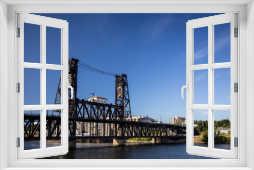 Fototapeta Naklejka Na Ścianę Okno 3D - USA, Oregon, Portland. Steel Bridge spans the Willamette River and was opened in 1912.