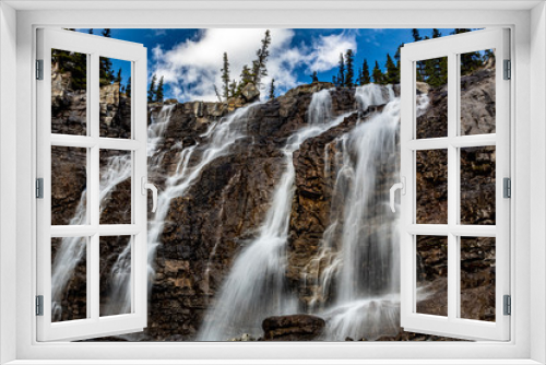 Fototapeta Naklejka Na Ścianę Okno 3D - Waterfall in the Mountains