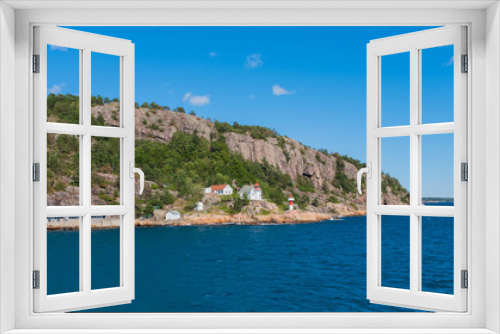 Fototapeta Naklejka Na Ścianę Okno 3D - Beautiful seascape norwegian coastline, coast of Kristiansand with small lighthouse, Scandinavia, Norway. July 2019