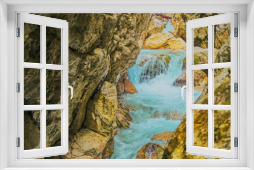 Fototapeta Naklejka Na Ścianę Okno 3D - Bright turquoise water in a brook in a gorge with cascades