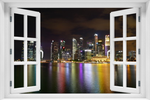 Fototapeta Naklejka Na Ścianę Okno 3D - Singapore Merlion Park and Singapore financial district skyline at Singapore Marina bay at night
