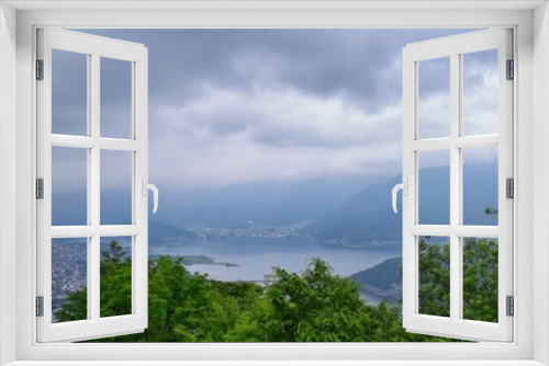 Fototapeta Naklejka Na Ścianę Okno 3D - Views around Mount Fuji Japan, including Kawaguchiko Tenjozan Park, Lake Kawaguchi from ferry boat on the lake and the gondola  observation. Asia.