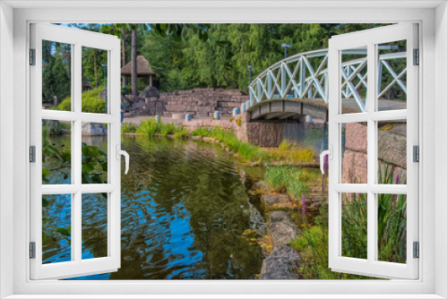 Fototapeta Naklejka Na Ścianę Okno 3D - View of bridge in summer park