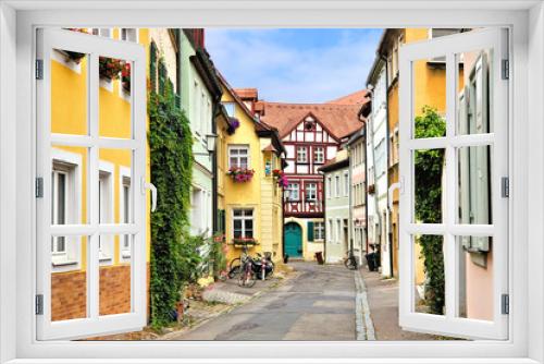 Fototapeta Naklejka Na Ścianę Okno 3D - Colorful street of traditional buildings in the Old Town of Bamberg, Bavaria, Germany