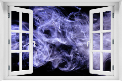 Blue wavy smoke on black background