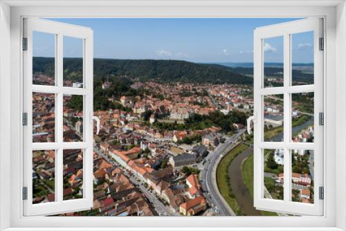 Aerial footage of an old eastern Europe   town on a sunny day