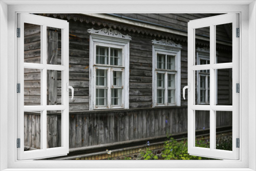Fototapeta Naklejka Na Ścianę Okno 3D - Typical house in Lithuania, Trakai. Antique old house with grey old wood