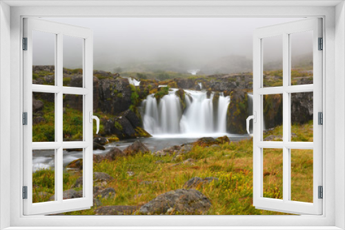 Fototapeta Naklejka Na Ścianę Okno 3D - Long exposure photo of waterfall, view of the small waterfall in Westfjords of Iceland, Europe.
