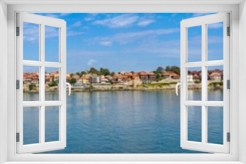 Fototapeta Naklejka Na Ścianę Okno 3D - Seaside landscape, panorama, banner - view of the embankment with fortress wall and beach in the city of Sozopol on the Black Sea coast in Bulgaria