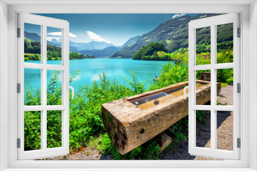 Fototapeta Naklejka Na Ścianę Okno 3D - Lungern lake with Swiss Alps in the background, Obwalden, Switzerland