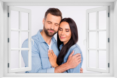 Portrait of charming people having long hair closed eyes hugging isolated over white background