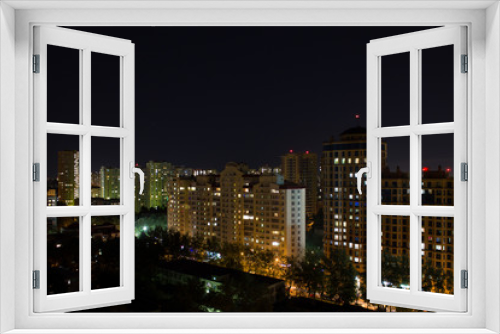 Fototapeta Naklejka Na Ścianę Okno 3D - panorama of the night city with modern residential buildings in Moscow Russia