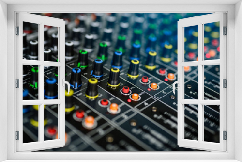 Professional audio mixing console in concert.