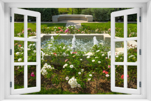 Fototapeta Naklejka Na Ścianę Okno 3D - decorative garden fountain with rose