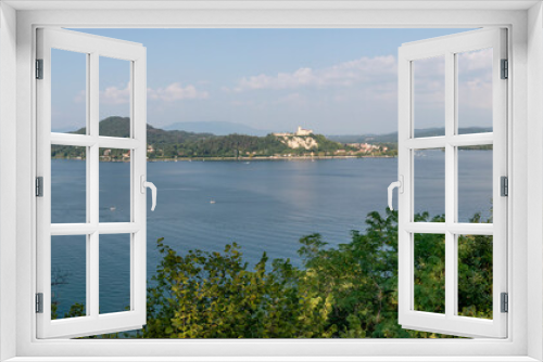 Fototapeta Naklejka Na Ścianę Okno 3D - Stunning panoramic view of the southern part of Lake Maggiore on a sunny day, Italy