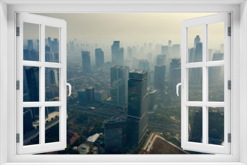 Foggy Jakarta cityscape at morning time
