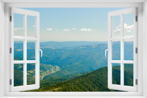 Fototapeta Naklejka Na Ścianę Okno 3D - Beautiful mountain landscape, with mountain peaks covered with forest and a cloudy sky. Ukraine mountains, Europe