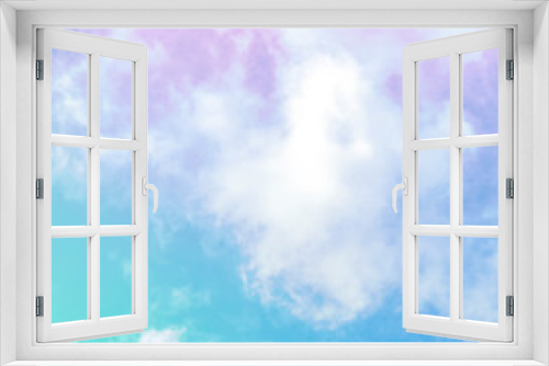 Teal blue and purple sky with white clouds, an abstract background with a place for text, toned image