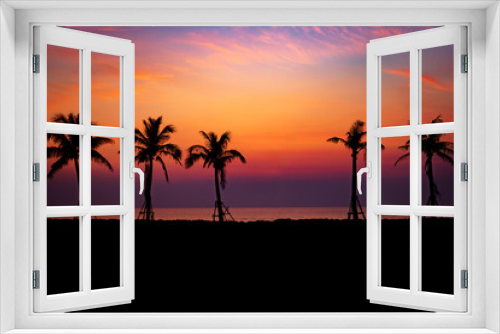 Fototapeta Naklejka Na Ścianę Okno 3D - Silhouette coconut palm trees on beach at sunset.sky twilight