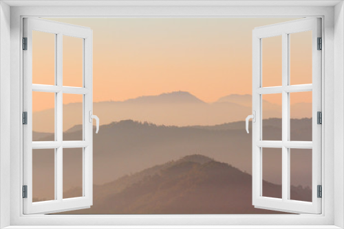 Fototapeta Naklejka Na Ścianę Okno 3D - Beautiful Sunset and sunrise on sky and golden twilight time with mist and fog in valley of mountain layer