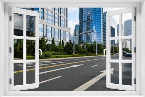 Fototapeta Naklejka Na Ścianę Okno 3D - empty highway with cityscape and skyline of qingdao,China.