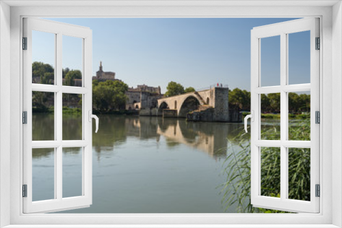 Fototapeta Naklejka Na Ścianę Okno 3D - France, july 2019: Saint Benezet bridge and Palace of the Popes in Avignon in a beautiful summer day