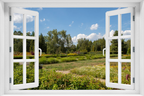 Fototapeta Naklejka Na Ścianę Okno 3D -  The colorful landscapes of the European Botanical Garden - deciduous and coniferous trees, stone mountains, wildflowers and green grass. Great place for walking.