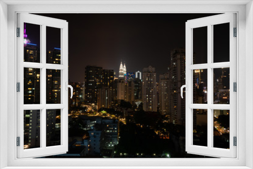 Fototapeta Naklejka Na Ścianę Okno 3D - Aerial drone view of Kuala Lumpur city skyline at night, Malaysia