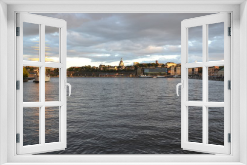 Fototapeta Naklejka Na Ścianę Okno 3D - Gray and golden sunset above the Stockholm's Soedermalm