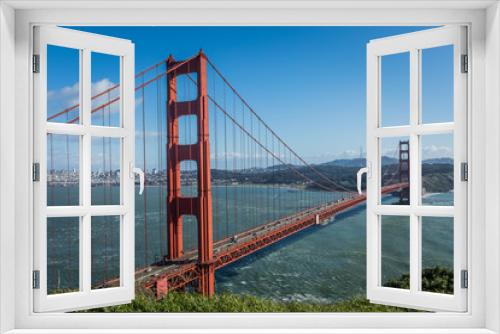 Fototapeta Naklejka Na Ścianę Okno 3D - A view of the Golden Gate from up high. 
