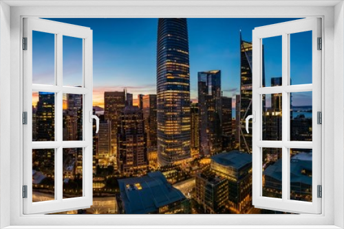 Fototapeta Naklejka Na Ścianę Okno 3D - Blue hour with a pink sunset over San Francisco skyline with Salesforce Tower in the middle and Salesforce park at the bottom