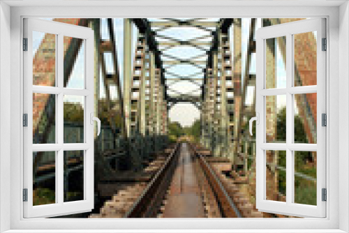Fototapeta Naklejka Na Ścianę Okno 3D - Old railway bridge over the river Begej, Zrenjanin, Serbia
