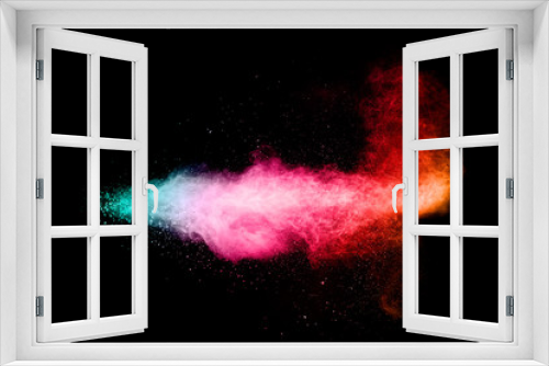 Fototapeta Naklejka Na Ścianę Okno 3D - Multi colored particles explosion on black background.Colorful dust splash.