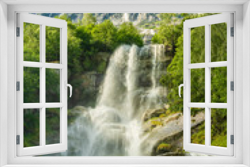 Fototapeta Naklejka Na Ścianę Okno 3D - The beautiful waterfall Vinnufallet, flowing down a mountainside in Norway. The tallest waterfall in Europe and the sixth tallest in the world, 865m (2,838 ft)