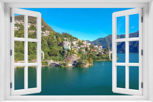 Fototapeta Naklejka Na Ścianę Okno 3D - Panorama aerial view of the lake Lugano, mountains and city Lugano, Ticino canton, Switzerland. Scenic beautiful Swiss town with luxury villas. Famous tourist destination in South Europe