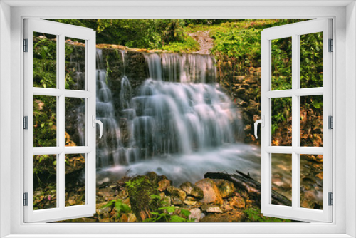 Fototapeta Naklejka Na Ścianę Okno 3D - Waterfall in the forest, summertime outdoor backgriund