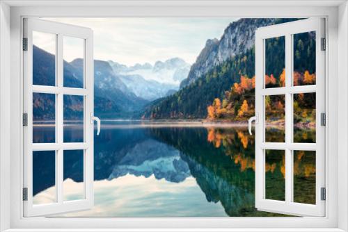 Fototapeta Naklejka Na Ścianę Okno 3D - Dramatic autumn scene of Vorderer ( Gosausee ) lake with Dachstein glacier on background. Exciting morning view of Austrian Alps, Upper Austria, Europe. Beauty of nature concept background.