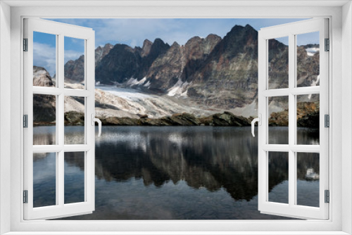 Fototapeta Naklejka Na Ścianę Okno 3D - cime della valmalenco riflesse in un lago alpino di alta quota