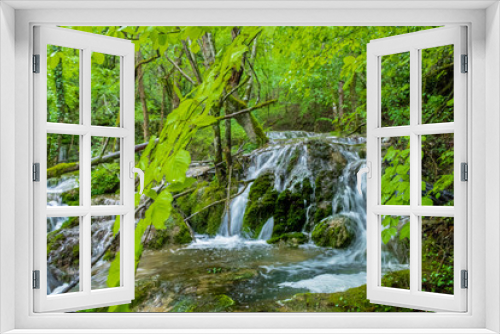 Fototapeta Naklejka Na Ścianę Okno 3D - great fluidity of water in the Tobera waterfalls, in the Basque country